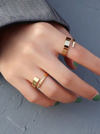rings, adjustable rings, gold rings, gold plated rings, waterproof rings for men and woman. cool and unique rings. designer inspired rings. trending rings in gold. unique rings. unique stainless steel rings. Kesley Boutique, jewelry, accessories, fashion jewelry, anti tarnish , rings that wont turn green, fashion jewelry, accessories trending on tiktok and instagram, unisex rings, affordable jewelry, fine jewelry